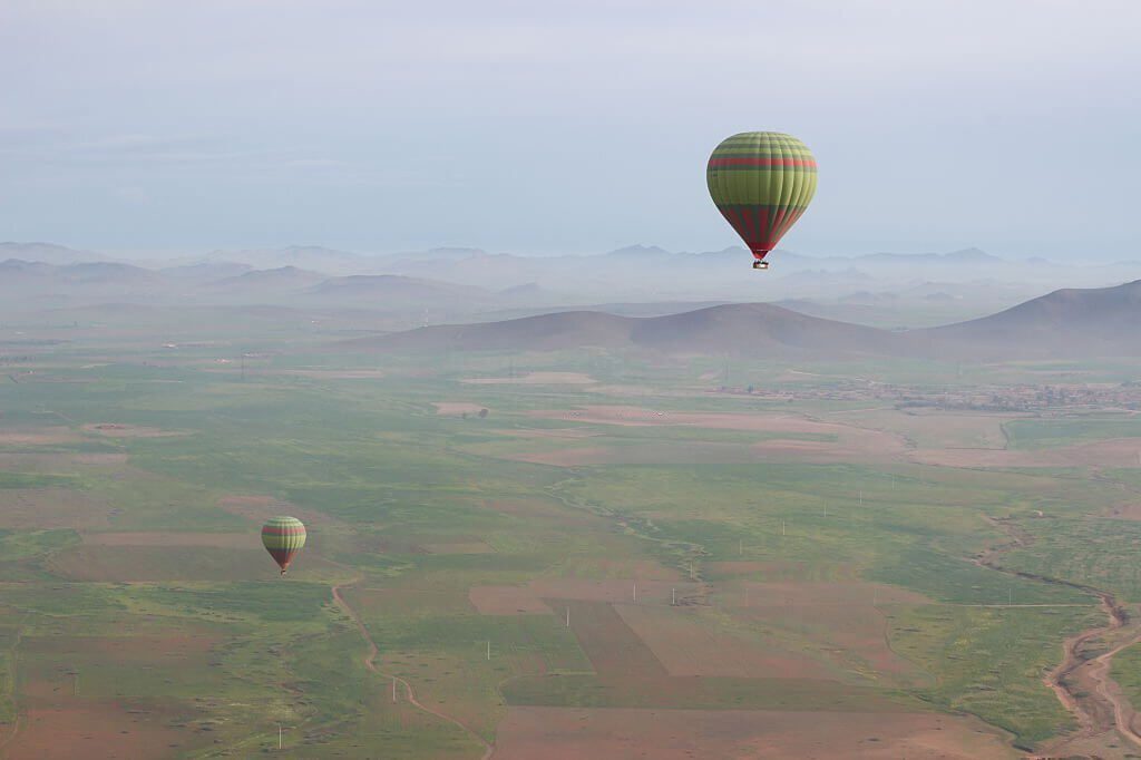 hot-air-balloons-in-the-distance-Hot-Air-Balloon-Flight-Marrakech-tour-by-nomad-excursion-travel-agency